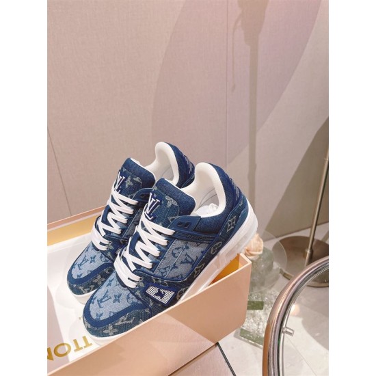 L Monogram Blue Denim Low Top Trainer Sneakers angled front perspective