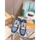 L Monogram Blue Denim Low Top Trainer Sneakers overhead view of toes