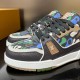 Toe box and lace detail of L Trainer Sneaker in multicolour and brown Close-up of the toe box and lace eyelets on the multicolour camouflage print leather trainer in multicolour and brown