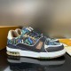 Pair of L Trainer Sneakers side by side view in multicolour and brown Pair of L Trainer Sneakers displayed side by side highlighting green and blue camouflage patterns in multicolour and brown