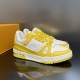 Diagonal Pairing View - L Trainer Low Top Yellow And White Leather Trainers Diagonal pairing view highlighting the vibrant yellow and white colourway