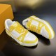 Paired Top Angle View - L Trainer Low Top Yellow And White Leather Trainers Paired display angled from above showing both yellow and white trainers