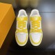 Frontal Top-Down View - L Trainer Low Top Yellow And White Leather Trainers Frontal top-down view highlighting the tongues and laces of L Trainer Low Top Yellow And White Leather Trainers