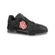 Side profile of L black monogram leather trainer low top shoes with red tag