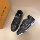 Angled pair view of L black monogram leather trainer low top shoes on beige surface in black and red