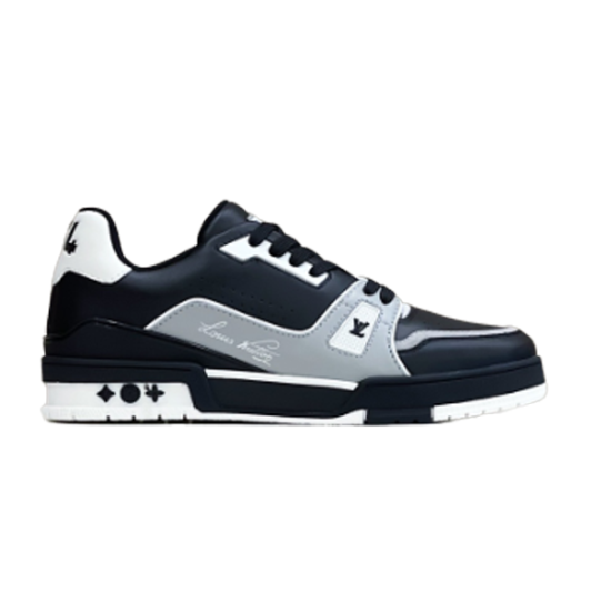 Profile view of L trainer low top leather sneakers in black, grey, and white