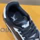 Close-up of the interior collar and branded insole of the L sneakers in black and grey
