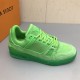 L green monogram denim sneakers outer profile Outer side profile showing the midsole of the L green monogram denim sneakers