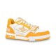 L Trainer Sneaker Yellow White Strap Low Top side view Side profile of yellow and white low top trainer