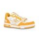 L Trainer Sneaker Yellow White Strap Low Top studio view Studio side profile of yellow and white trainer