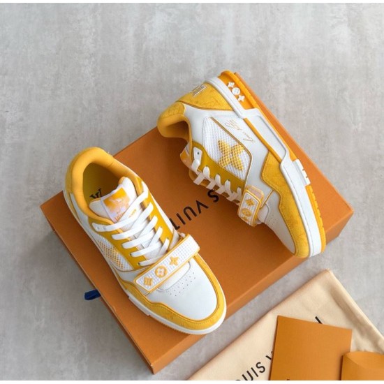 L Trainer Sneaker Yellow White Strap Low Top pair display Angled pair arrangement in yellow and white