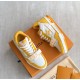 L Trainer Sneaker Yellow White Strap Low Top pair display Angled pair arrangement in yellow and white