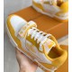 L Trainer Sneaker Yellow White Strap Low Top strap detail Close up of front strap and perforated toe box in yellow and white