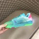 L Trainer Low Top Sneakers In Green Grained Leather - Inner Side View in green and pink Inner lateral view showing stitching details of L trainer low top sneakers in green grained leather in green and pink