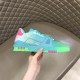 L Trainer Low Top Sneakers In Green Grained Leather - Outer Side Script in green and pink Outer side view highlighting signature script and panels on L trainer low top sneakers in green grained leather in green and pink