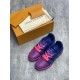 Pair of L low top trainer leather sneakers in pink and blue gradient displayed next to packaging