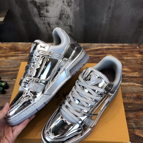 Quarter Perspective of L Trainer Metallic Silver Low Top Sneakers Upper quarter view highlighting collar and tongue of L Trainer Metallic Silver Low Top Sneakers