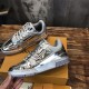 Angled Side View of L Trainer Metallic Silver Low Top Sneakers Angled perspective showing side and midsole of L Trainer Metallic Silver Low Top Sneakers