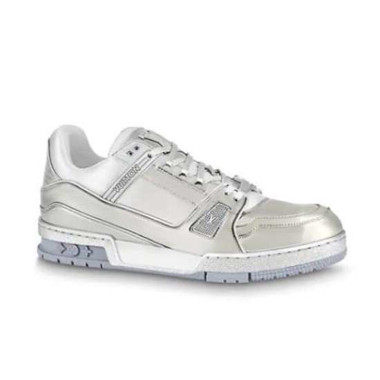 Studio Side Profile of L Trainer Metallic Silver Low Top Sneakers Studio side profile shot of L Trainer Metallic Silver Low Top Sneakers