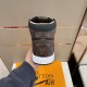 Rear heel view of the brown and black L high top trainers Rear view of the brown and black L high top trainers showing heel panel and sole