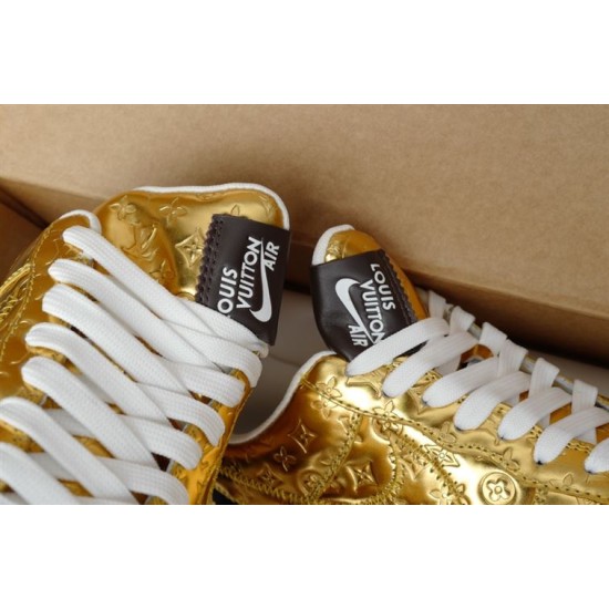 Detailed view of the dark brown tongue tag with white Nike branding in gold