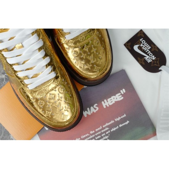 Close-up view of the perforated metallic gold toe box and laces