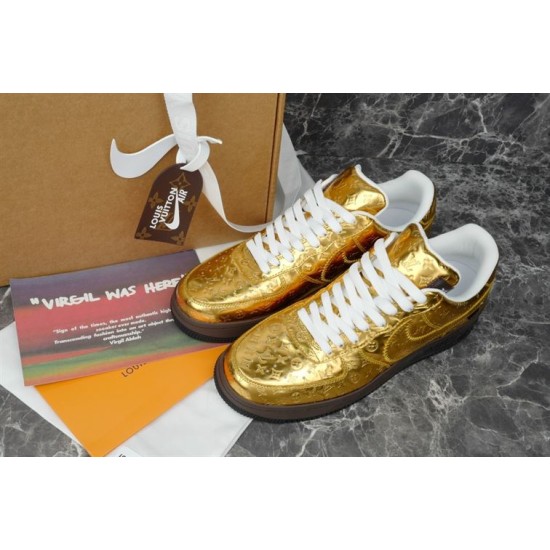 Top view of metallic gold Nike Air Force 1 Low trainers with white laces