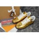 Top view of metallic gold Nike Air Force 1 Low trainers with white laces