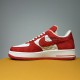 Nike Air Force 1 Low-Top Red White Trainers Medial Aspect Medial side view of Nike Air Force 1 Low-Top Red White Trainers displaying printed text on the upper panel