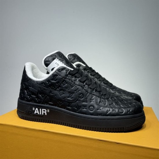 Nike Air Force 1 Low-Top Embossed Trainers Black pair angled view on box