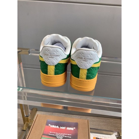 Nike Air Force 1 Low-Top Heel Tab View in yellow and green Rear view showing the white heel tabs with debossed branding on both trainers in yellow and green