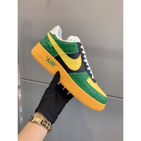 Nike Air Force 1 Low-Top Yellow And Green Trainer in Hand Gloved hand holding a single yellow and green Nike Air Force 1 trainer