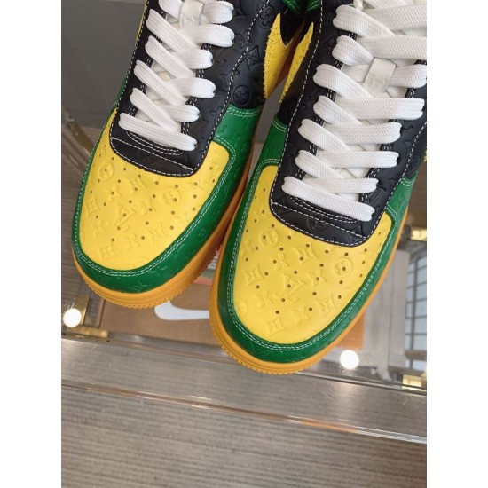 Nike Air Force 1 Low-Top Yellow Toe Cap Detail in yellow and green Close-up of the perforated yellow toe caps on Nike Air Force 1 trainers in yellow and green