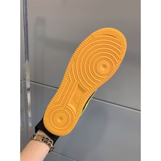 Nike Air Force 1 Low-Top Rubber Outsole Tread in yellow and green Full view of the yellow textured rubber outsole of the trainer in yellow and green
