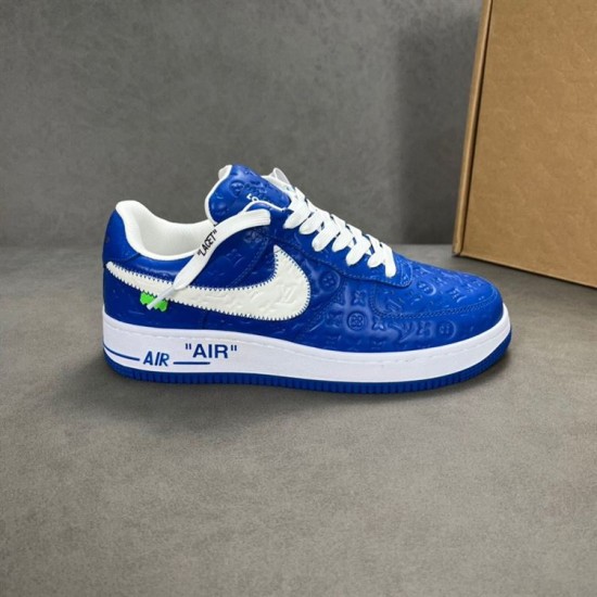 Nike Air Force 1 By Virgil Abloh Blue Trainer Lateral Profile in blue and white Lateral side view of a single Nike Air Force 1 By Virgil Abloh blue trainer resting on a grey surface in blue and white