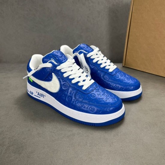 Nike Air Force 1 By Virgil Abloh Blue Trainers Pair View in blue and white Pair of Nike Air Force 1 By Virgil Abloh blue trainers shown at a three-quarter angle in blue and white