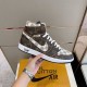 Nike Air Jordan 1 Retro High Trainers in Brown Handheld View Hand holding a brown Nike Air Jordan 1 Retro High Trainer showing lateral side