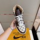 Nike Air Jordan 1 Retro High Trainers in Brown Upper Detail Top view of brown Nike Air Jordan 1 Retro High Trainer held above box