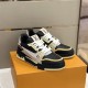Nike Black And Cream Panel Low Top Trainers Pair View Pair of Nike Black And Cream Panel Low Top Trainers resting on an orange box