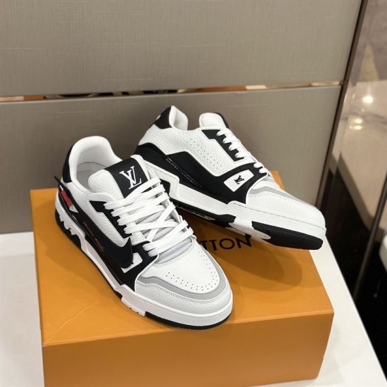 L White And Black Trainers Front Three-Quarter View Front three-quarter view of L white and black trainers highlighting the lacing system