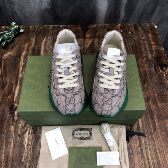 Monogram Canvas Chunky Trainers Overhead View in beige and green Overhead view of pair of beige monogram trainers with green soles