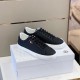Moncler Dark Blue Trainers Pair Display in dark blue and white Pair of Moncler dark blue leather trainers resting on white shoe box