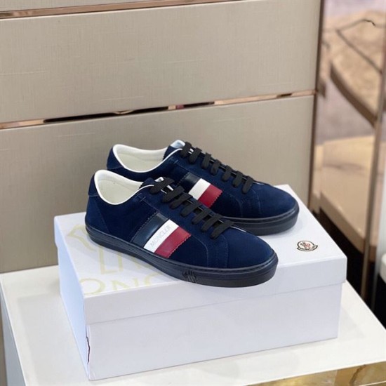 Moncler New Monaco Suede Trainers Navy Low Top Pair View Moncler New Monaco Suede Trainers Navy Low Top pair resting on white shoe box