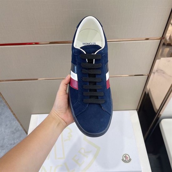 Moncler New Monaco Suede Trainers Navy Low Top Overhead View Overhead top view of Moncler New Monaco Suede Trainers Navy Low Top held in hand
