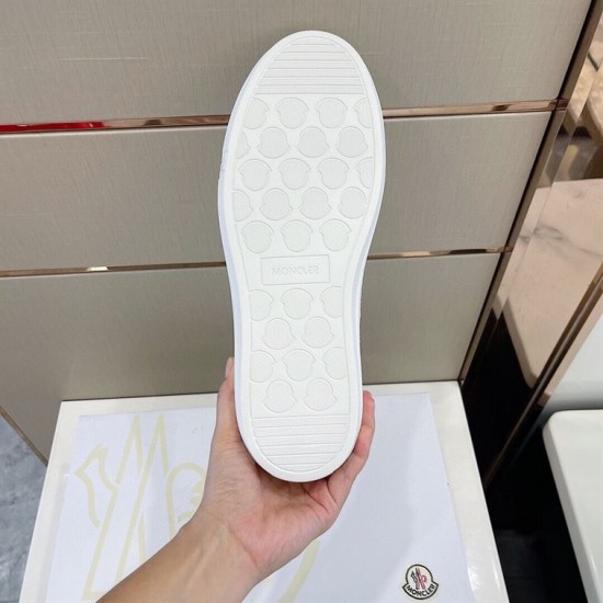 Underside view of white Moncler rubber sole pattern