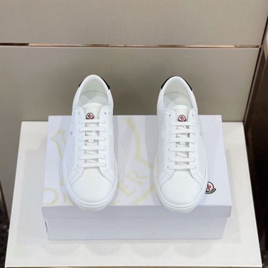 Top view of Moncler white leather trainers with lace-up fastening