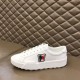 Lateral side view of Moncler Promyx white trainer resting on a surface