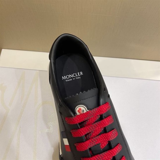 Moncler Promyx Black Trainer Insole Detail in black and red Close-up of Moncler Promyx shoe opening displaying branded inner sole and tongue badge in black and red