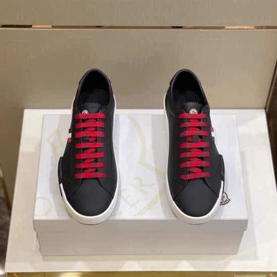 Moncler Promyx Black Trainers Top View in black and red Top-down view of Moncler Promyx black leather trainers showcasing red laces and tongue badges