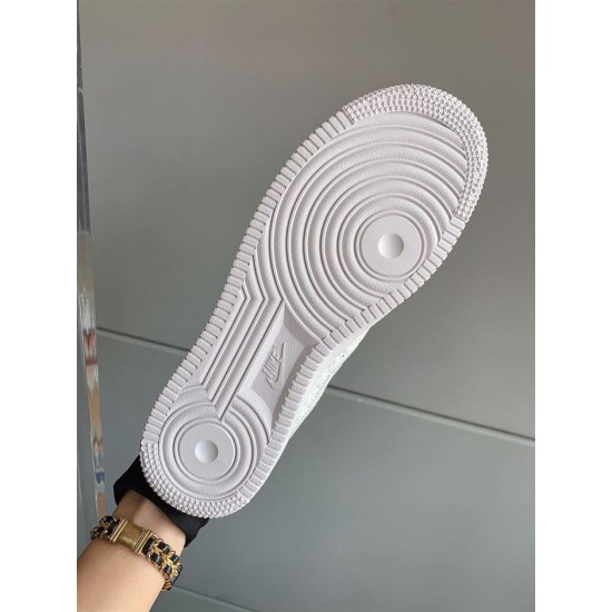 Outsole View of L Air Force Embossed Monogram White Trainers Underside traction pattern on the white rubber outsole